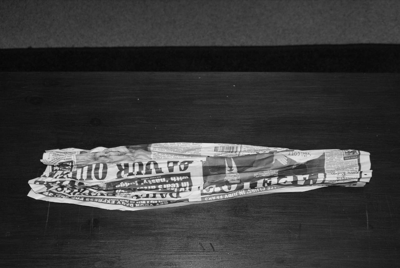 Sheet of newspaper for fireplace